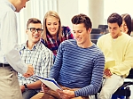 teacher is teaching students who are learning to become a teacher